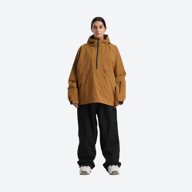 Women's waterproof 2L anorak snow jacket and pants - caramel tan anorak jacket with black pants, on-model front view