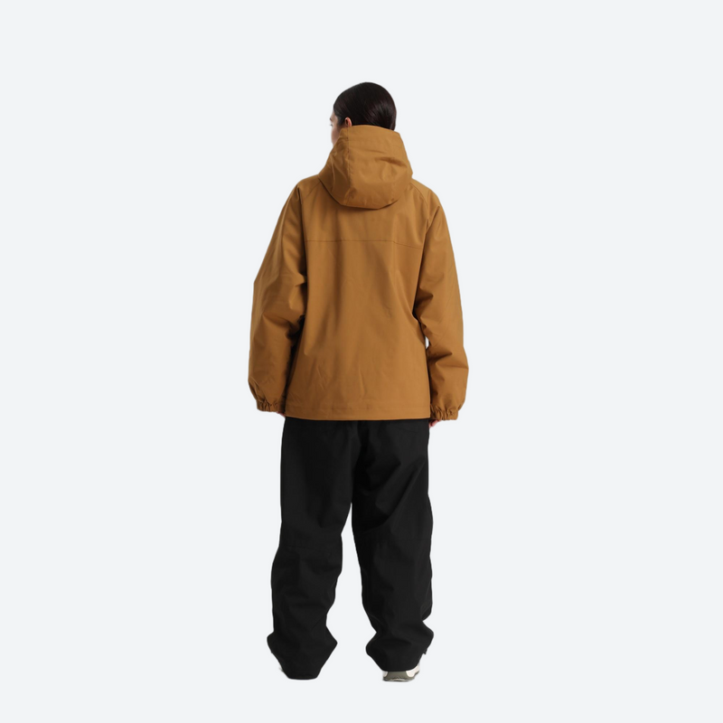 Women's 2-layer snowboard jacket and pants - caramel tan anorak jacket with black pants, for skiing and snowboarding