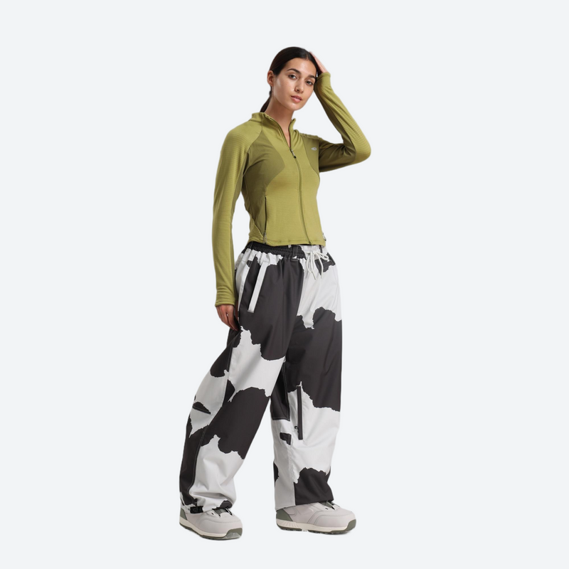 Women's 2-layer snowboard jacket and pants - olive green base layer top with cow print snow pants, relaxed fit layers easily