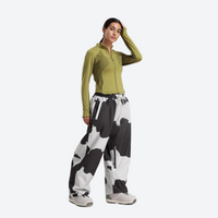 
                  
                    Women's 2-layer snowboard jacket and pants - olive green base layer top with cow print snow pants, for resort and street wear
                  
                