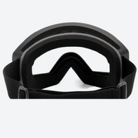 
                  
                    Snow goggles with quick adjust strap buckle - black frame cylindrical ski goggles, top foam view, for winter mountain trips
                  
                