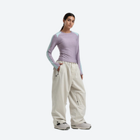 
                  
                    Women's breathable ski jacket set - lavender base layer top with cream snow pants, for resort and street wear
                  
                