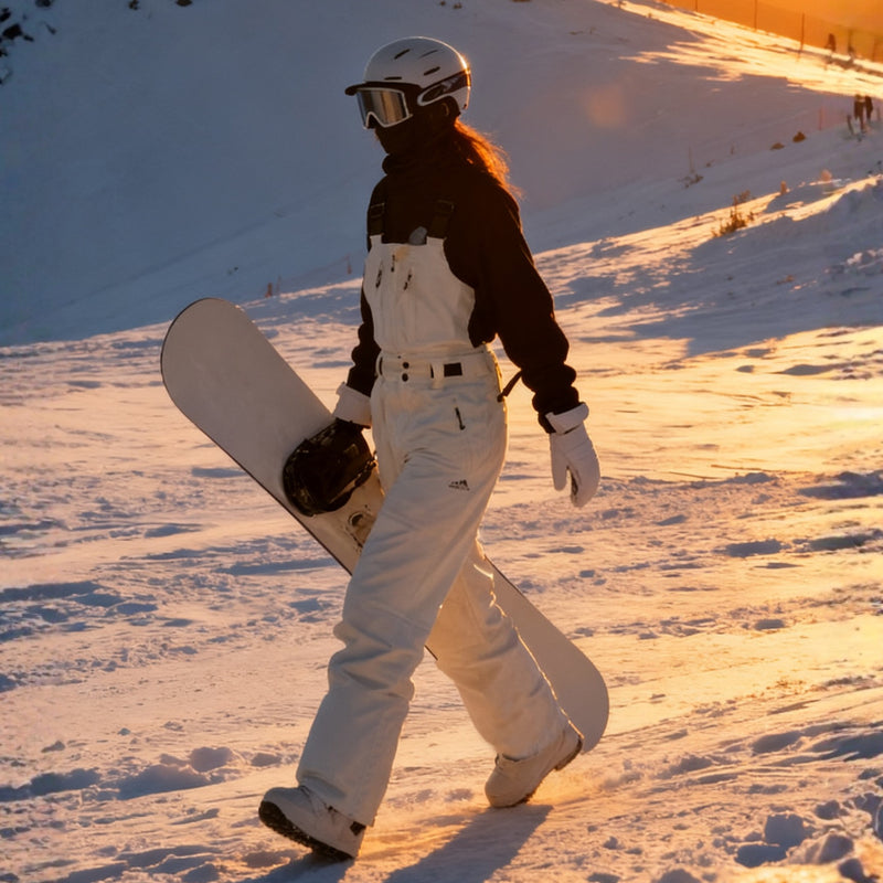 Breathable 3-layer ski bibs with cross-back straps - white bib pants with black top, for skiing and snowboarding