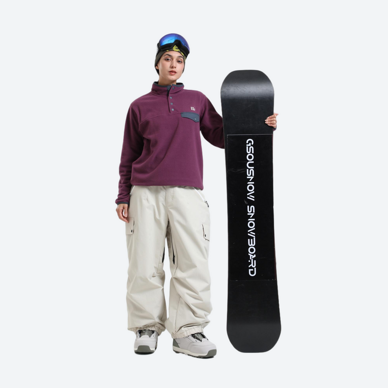 Waterproof 3L cargo snow pants - cream snow pants with purple pullover, for powder days and winter commute