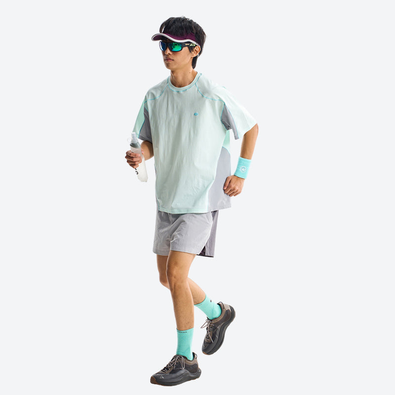 PFC-free eco trail shorts with quick-dry shell - light blue water-repellent shorts with mint top, running view with cap