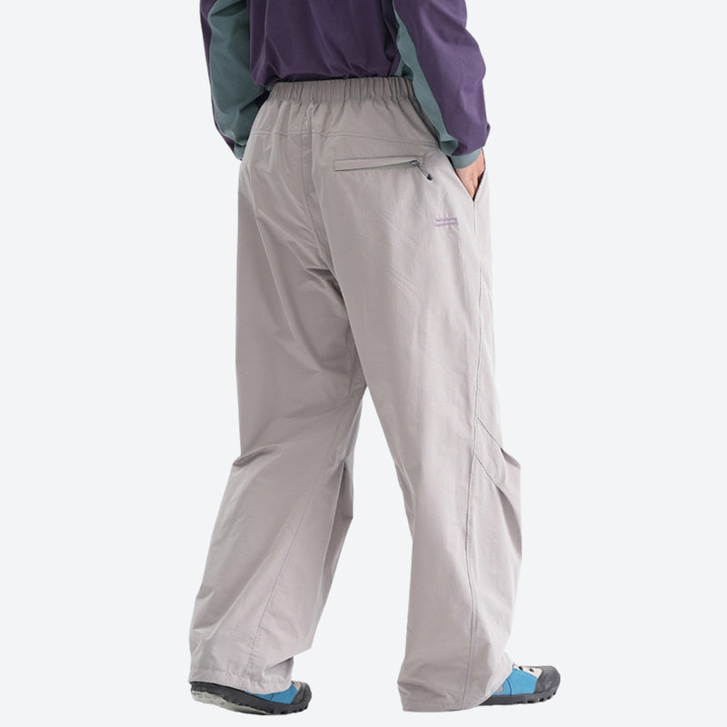 Breathable lightweight wide-leg trail pants - light gray wide-leg hiking pants with purple top, back standing view