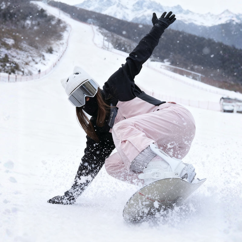 Breathable 3-layer ski bibs with cross-back straps - pink bib pants with black top, for skiing and snowboarding