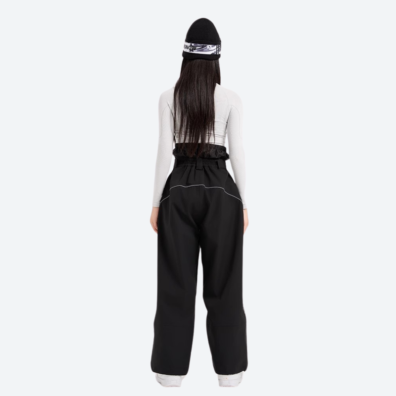 Women's colorblock snowboard jacket with wide-leg pants - black wide-leg snow pants with white top, on-model back view