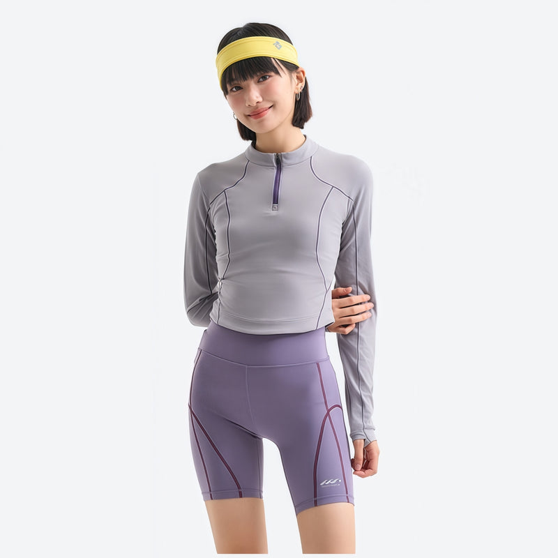 Women's stretchy fitted tee for outdoor - light gray half-zip long sleeve tee on women with headband, front standing view