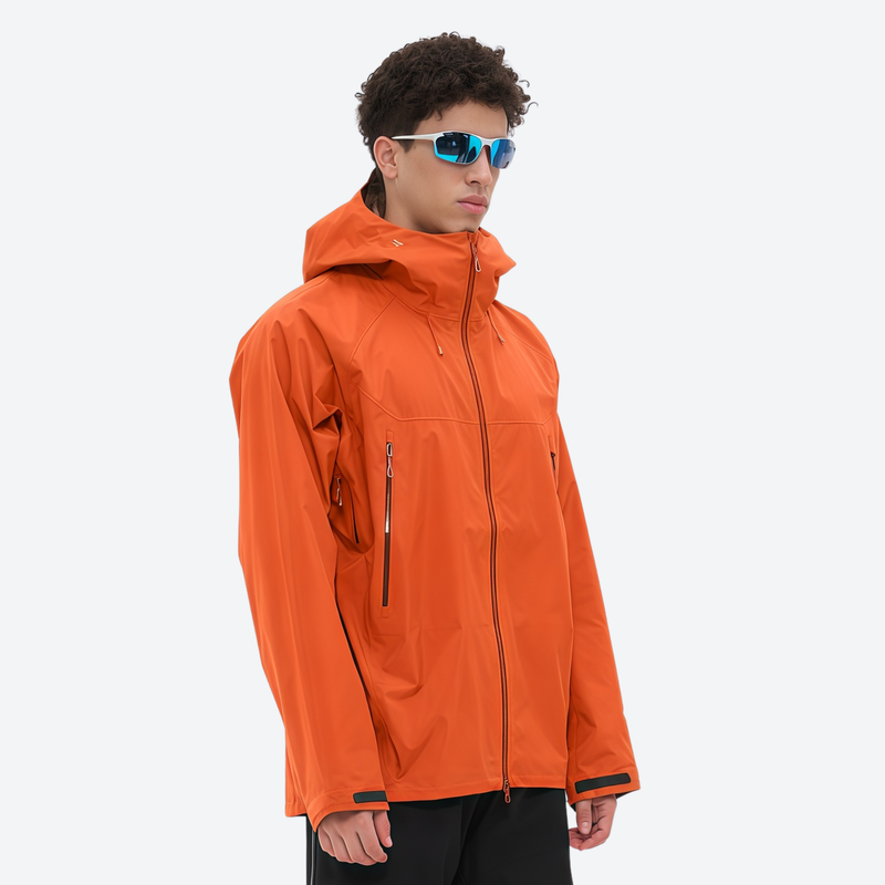 Men's waterproof mountain shell with slash pockets - orange hardshell jacket, for cold-weather winter sports
