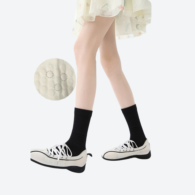 Breathable ergonomic merino wool socks - merino wool socks on women with skirt and sneakers, for layering in cool weather