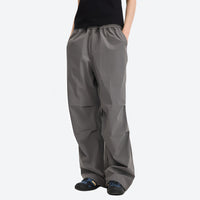 
                  
                    Water-repellent cargo hiking pants with drawcord hem - gray wide-leg cargo pants with black tee, for sunny-weather trekking
                  
                