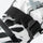 Snow gloves with card pocket and pair clip - white print snow glove strap, buckle strap close-up, for resort ski days