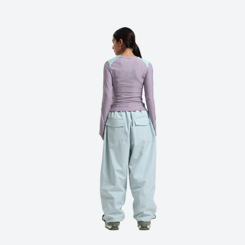 Women's 2-layer snowboard jacket and pants - lavender base layer top with mint snow pants, for cold-weather winter sports