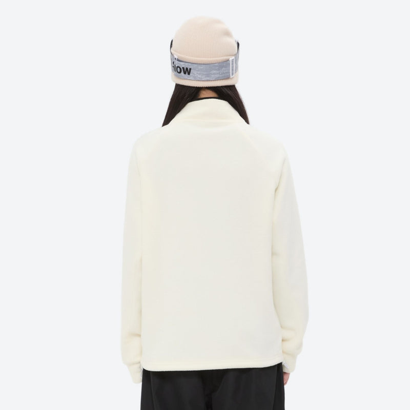Breathable quick-dry fleece liner for layering - cream fleece liner jacket on women with beanie, for skiing and snowboarding