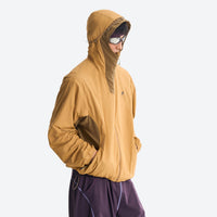 
                  
                    Packable hooded sun jacket for outdoor - ginger yellow sun jacket on men with sunglasses, for hiking and trail walking
                  
                