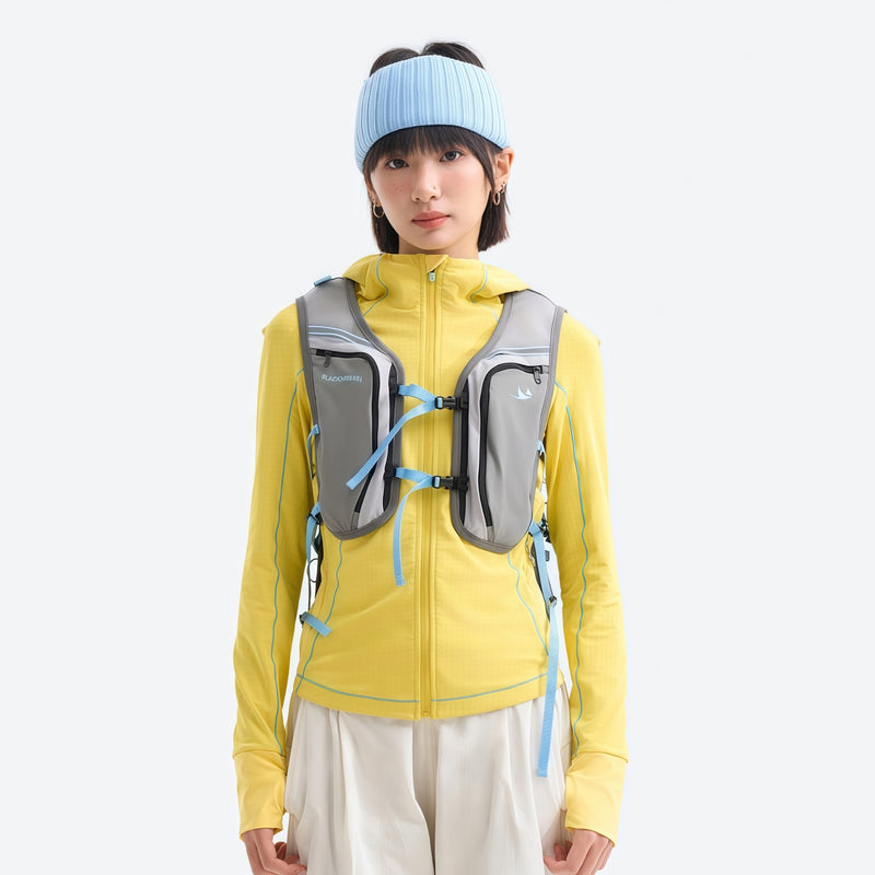 Women's 7A antibacterial hooded sun jacket - yellow slim fit sun jacket on women with headband, front view with vest pack