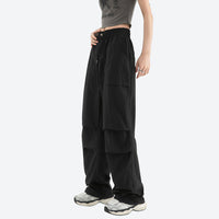
                  
                    Women's zip-off convertible hiking pants - black zip-off hiking pants with gray top, for hiking and trail walking
                  
                
