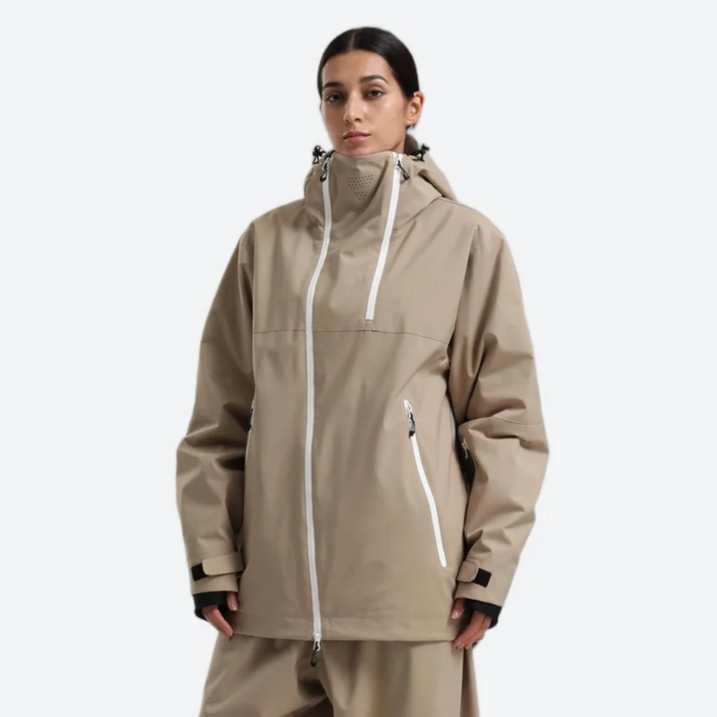 Women's breathable 2-layer snowboard jacket and pants - tan, on-model three-quarter front view, for resort and street wear