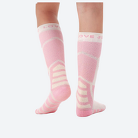 
                  
                    Kids compression merino wool ski socks - pink kids compression merino ski socks on feet, for kids skiing and snowboarding
                  
                