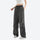 Women's quick-dry trail pants converting to shorts - dark gray zip-off hiking pants with white top, for travel and city walks