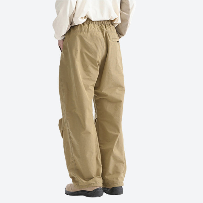 Breathable lightweight wide-leg trail pants - khaki tan wide-leg hiking pants with cream top, for warm-weather trekking