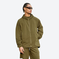 
                  
                    Recycled fiber moisture-wicking sun jacket - olive coolmax sun jacket on men, front standing view, for fishing and water days
                  
                