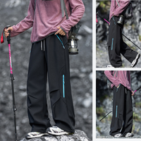 
                  
                    Breathable warm trail pants with soft fleece lining - black fleece-lined hiking pants with pink jacket
                  
                