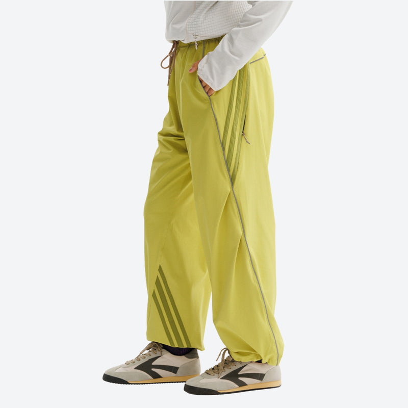 Breathable water-repellent trekking pants with vents - lime green pants with cream top, for trail and mountain walks