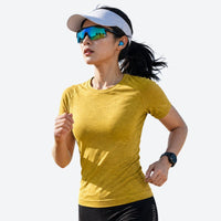 
                  
                    Soft merino wool baselayer with temperature control - yellow merino wool baselayer tee on women, for skiing and snowboarding
                  
                