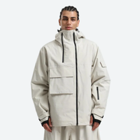 
                  
                    Men's waterproof 2L snow jacket and pants - cream, on-model front view, for resort and street wear
                  
                