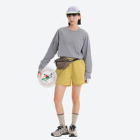 
                  
                    Water-repellent running shorts with drawcord waist - yellow running shorts with gray top, for gym and outdoor workouts
                  
                