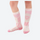 Kids breathable knee-high merino ski socks - pink kids compression merino ski socks on feet, for snow play and winter commute