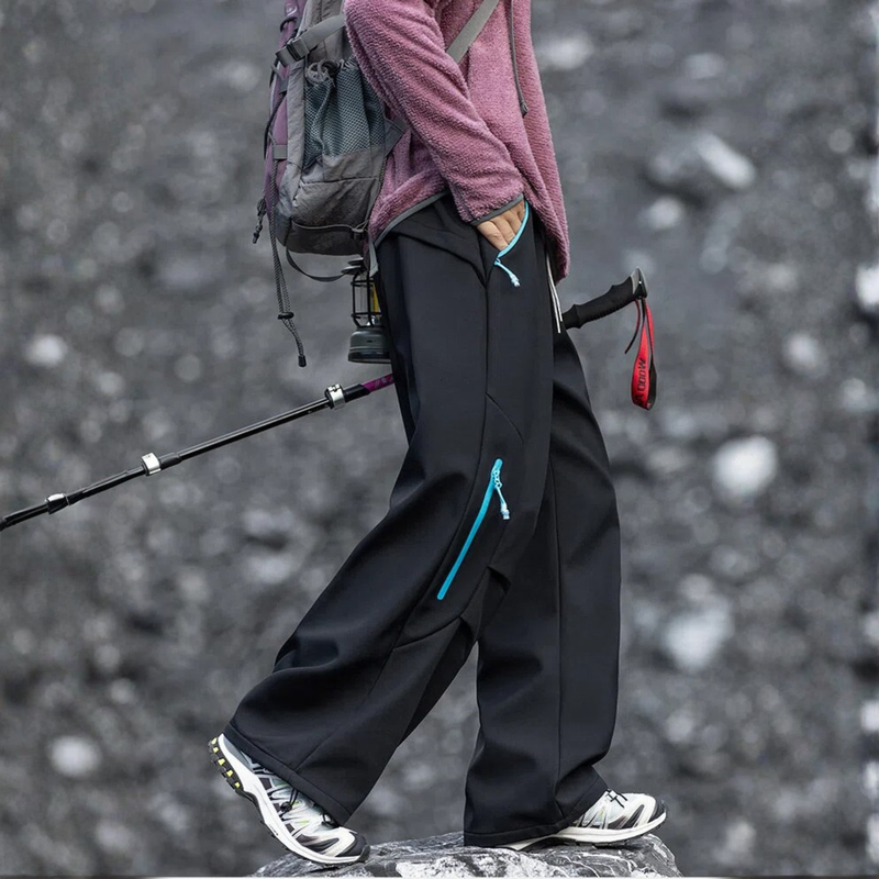 Water-repellent fleece hiking pants for cold days - black fleece-lined hiking pants with pink jacket