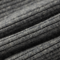 
                  
                    Knitted merino balaclava with drawcord - gray knitted merino wool balaclava, ribbed knit close-up, for winter mountain trips
                  
                