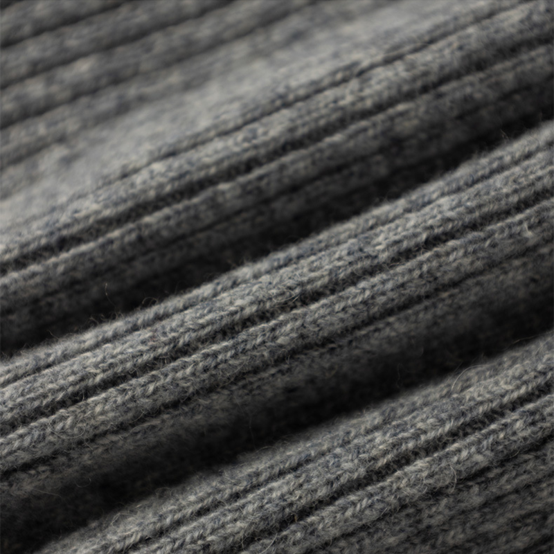 Knitted merino balaclava with drawcord - gray knitted merino wool balaclava, ribbed knit close-up, for winter mountain trips
