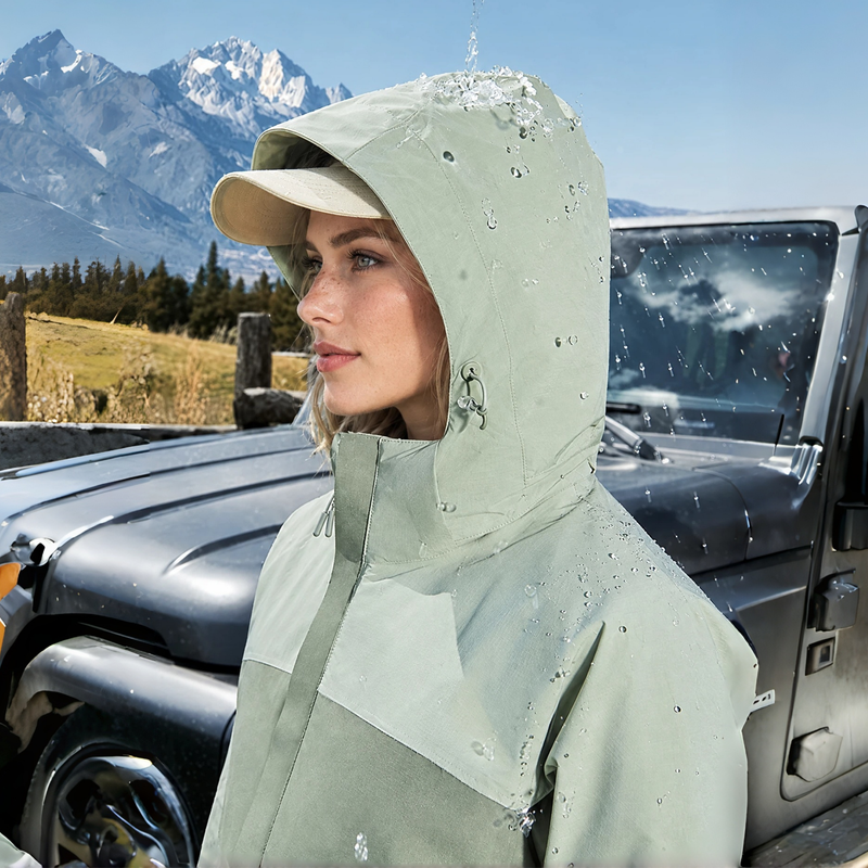 Men's 3-in-1 hardshell jacket with fleece liner - sage 3-in-1 jacket, mountain close-up with hood up, for hiking and travel