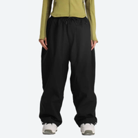 
                  
                    Women's waterproof 2L snow jacket and pants - black snow pants with olive top, for cold-weather winter sports
                  
                