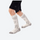 Kids cushioned compression socks for snow play - gray kids compression merino ski socks on feet, for kids sports and training