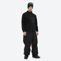 
                  
                    Lightweight high-warmth breathable fleece liner jacket - black fleece liner jacket on men with helmet, full-body walking view
                  
                