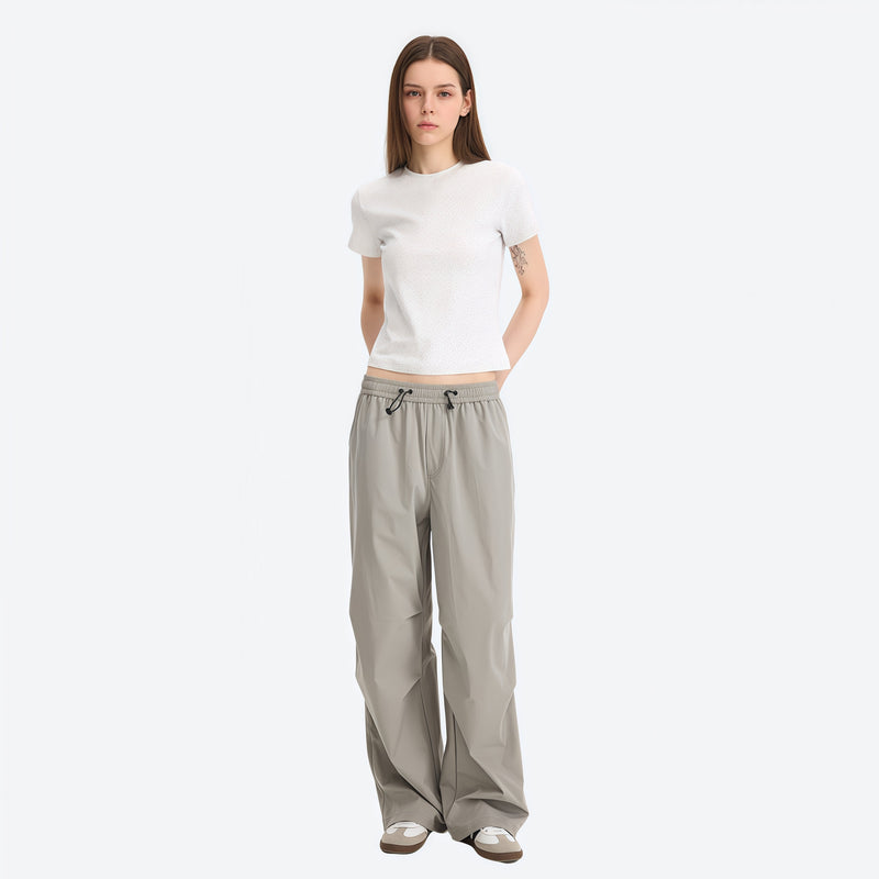 Unisex UPF50 water-repellent cargo pants - light gray wide-leg cargo pants with white tee, for sunny-weather trekking
