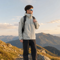 
                  
                    Men's waterproof mountain shell with slash pockets - light gray hardshell jacket, for alpine hiking and travel
                  
                