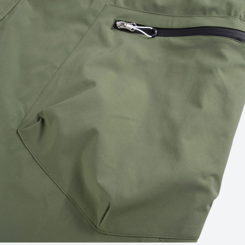 Unisex snowboard jacket and bibs set - olive green bib pants, pocket zip close-up detail, for powder and piste riding