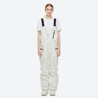 
                  
                    Unisex snowboard jacket and bibs set - white bib pants, on-model front view, for powder and piste riding
                  
                