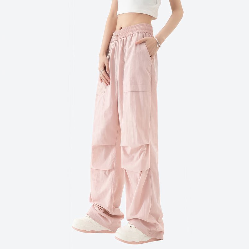Women's quick-dry trail pants converting to shorts - pink zip-off hiking pants with white top, for hiking and trail walking