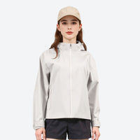 
                  
                    Women's breathable 3-layer shell with waist cinching fit - white hardshell jacket, for hiking and trail walking
                  
                