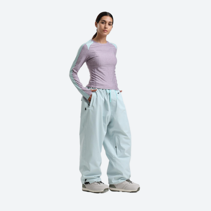 Women's 2-layer snowboard jacket and pants - lavender base layer top with mint snow pants, for resort and street wear