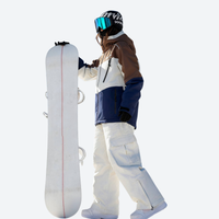 
                  
                    Unisex 3L snowboard jacket and pants - brown white and navy colorblock, for powder and piste riding
                  
                