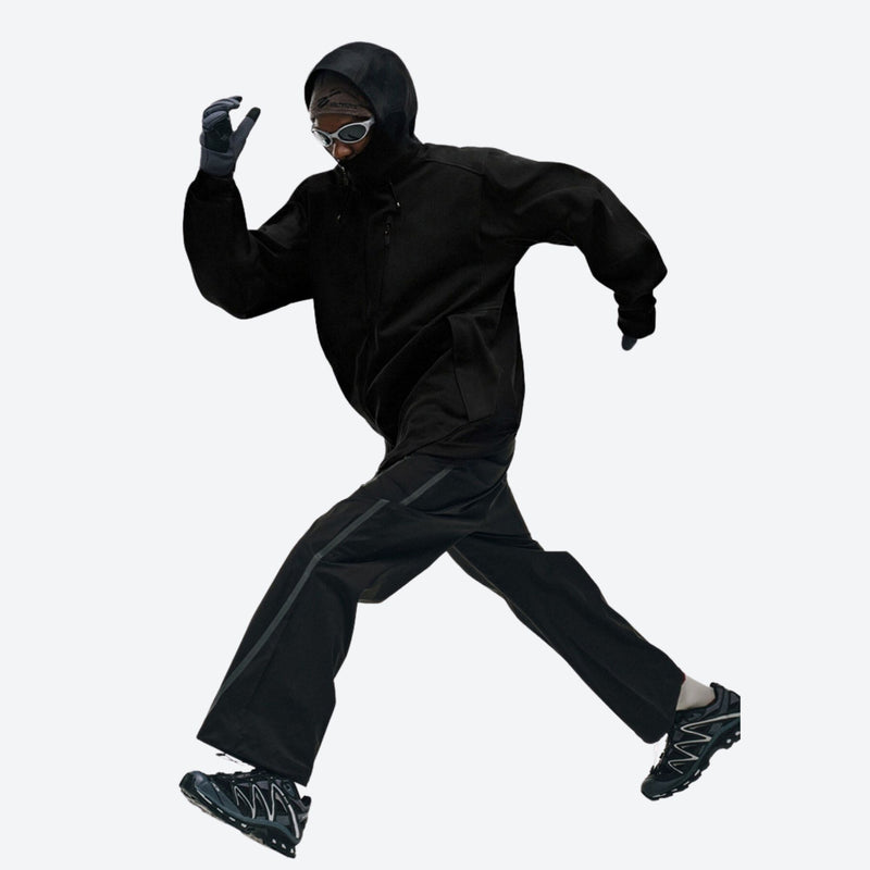 Unisex softshell snowboard jacket with welded seams - black softshell jacket, action jumping pose, for resort and street wear