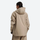 Women's waterproof 2L snow jacket and pants - tan jacket, on-model back view, for powder days and winter commute